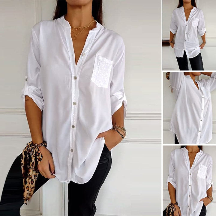 Blusa Negra con Detalles Brillantes de Corte Fluido